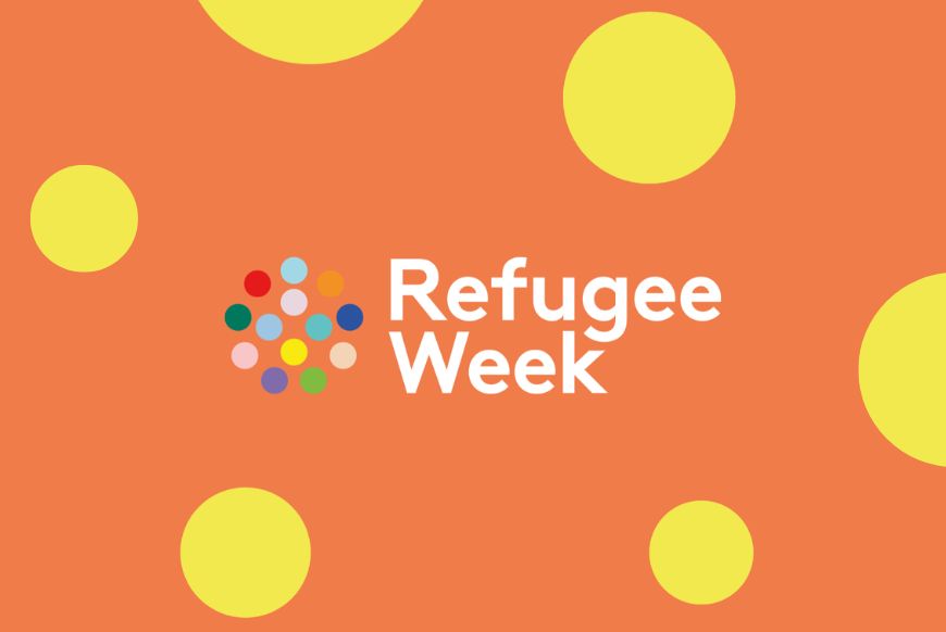 Writing 'Refugee Week' on an orange background with yellow spots around it